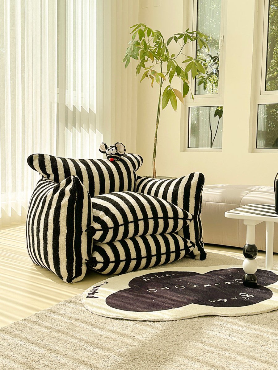 Fauteuil confortable rayé  - Alban